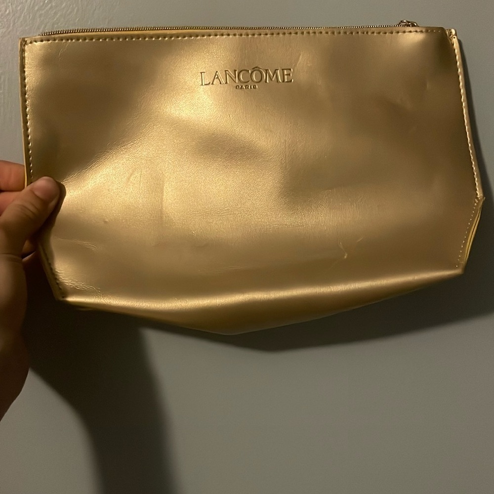 A makeup bag or a pencil case